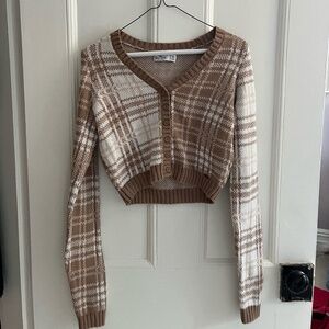 V-neck brown and white button down sweater
